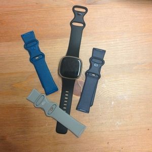 Fitbit versa 3 in gold with 4 straps